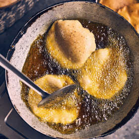 Used cooking oil being poured